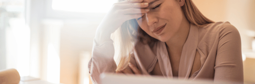 Woman suffering migraine 