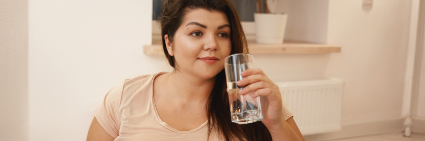 Woman drinking a glass of water