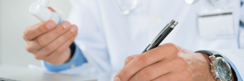 doctor deciding to prescribe medication