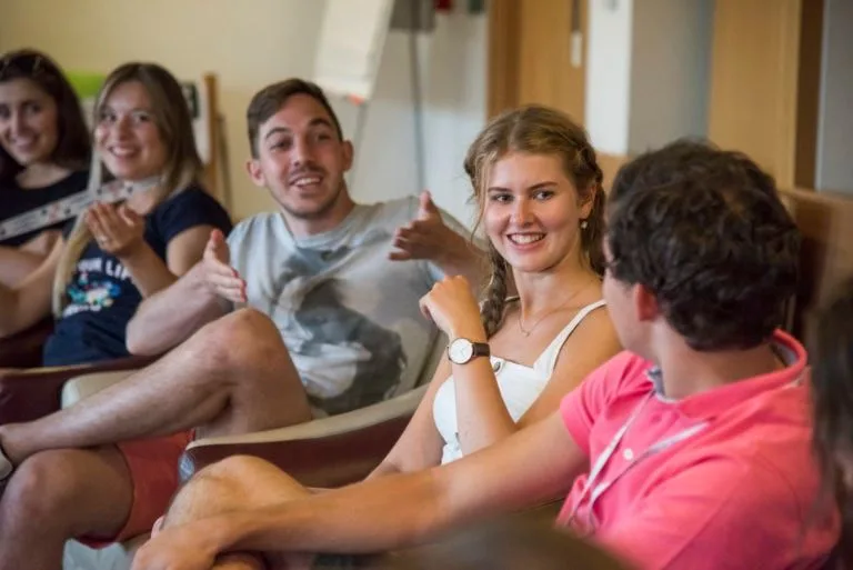 group-of-students-talking-in-class