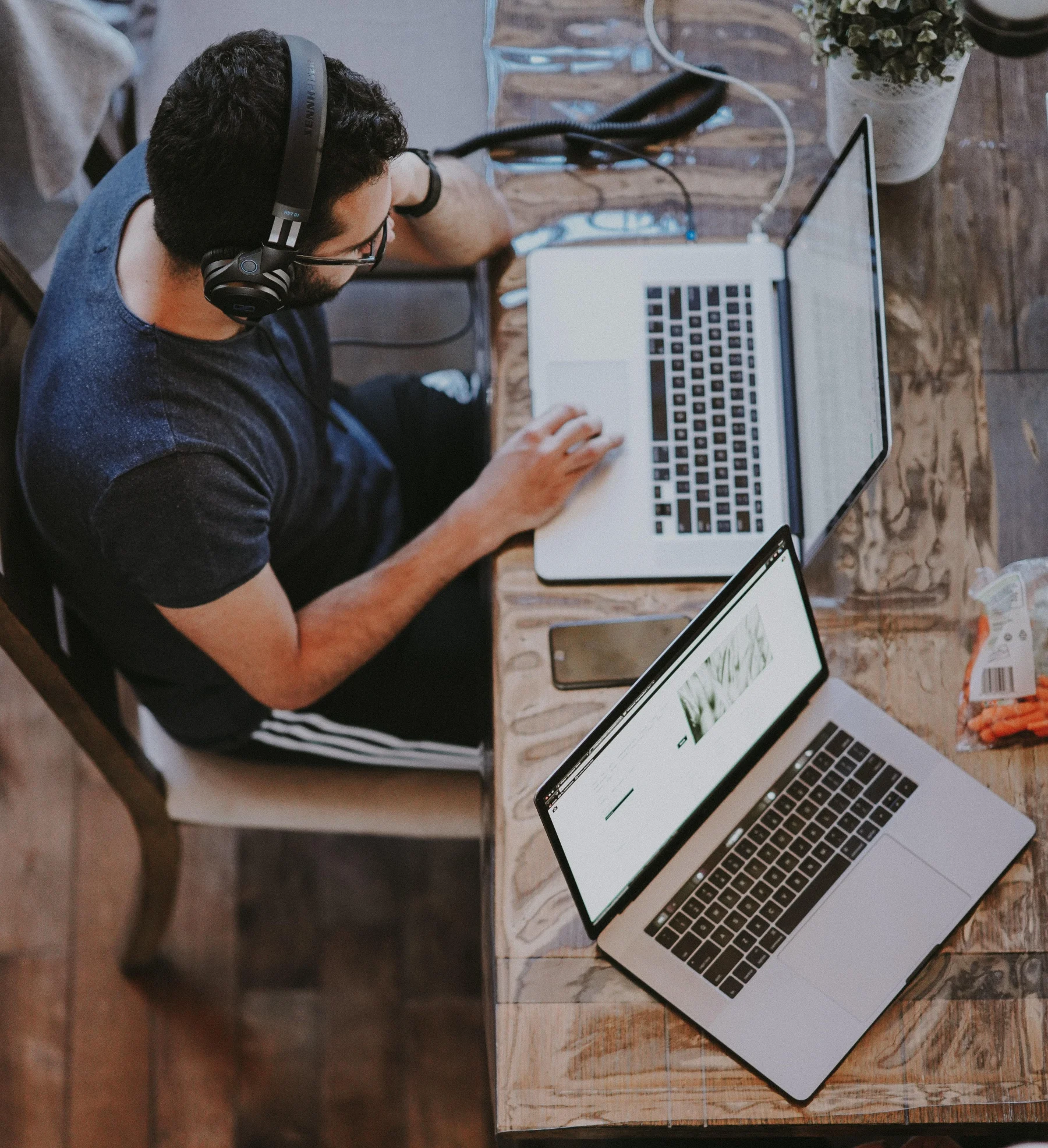 student-working-on-laptop-in-coffee-shop