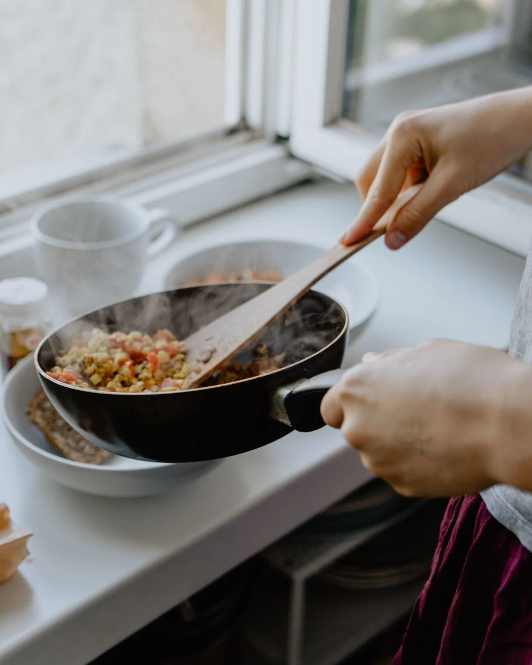 close-up-pan-of-food-being-cooked