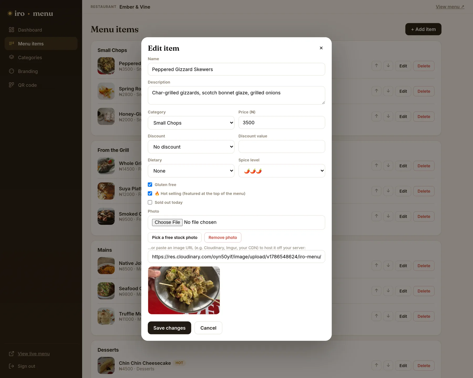 The Edit item panel open over the menu list. Fields for name, description, category and price,
                   then discount, dietary and spice level, tick boxes for gluten free, hot selling and sold out
                   today, a photo chooser with the current dish photo, and Save changes.