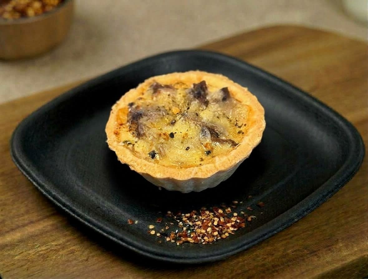 Beef quiche by The Cakery, cafe in Kannur