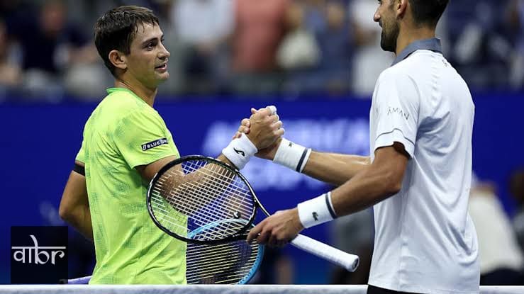 Navone and Djokovic shake hands after the monumental upset.. 