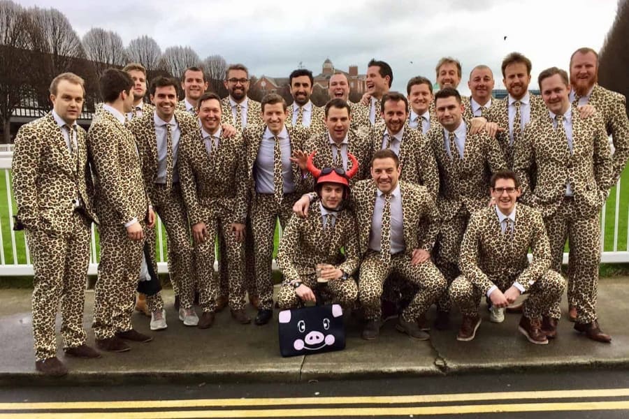 Big-group-of-men-in-matching-leopard-print-suit-and-tie