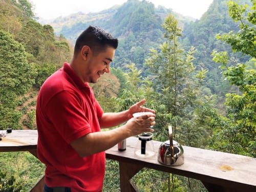 Coffee farmer brewing coffee