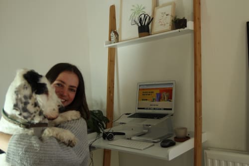 Polly at her desk