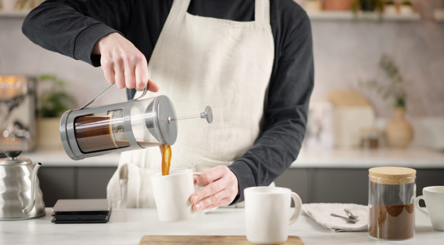 Pouring coffee from a cafetière