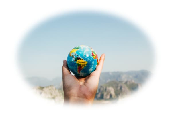 Earth in the Palm of your Hand hand holding a globe