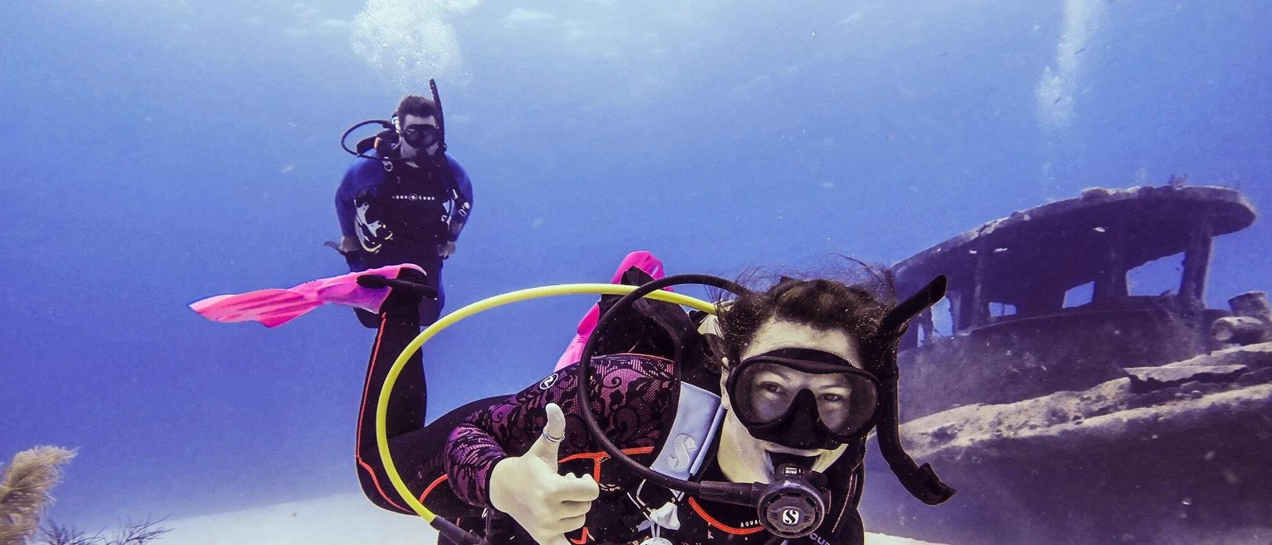 divers posing for the camera