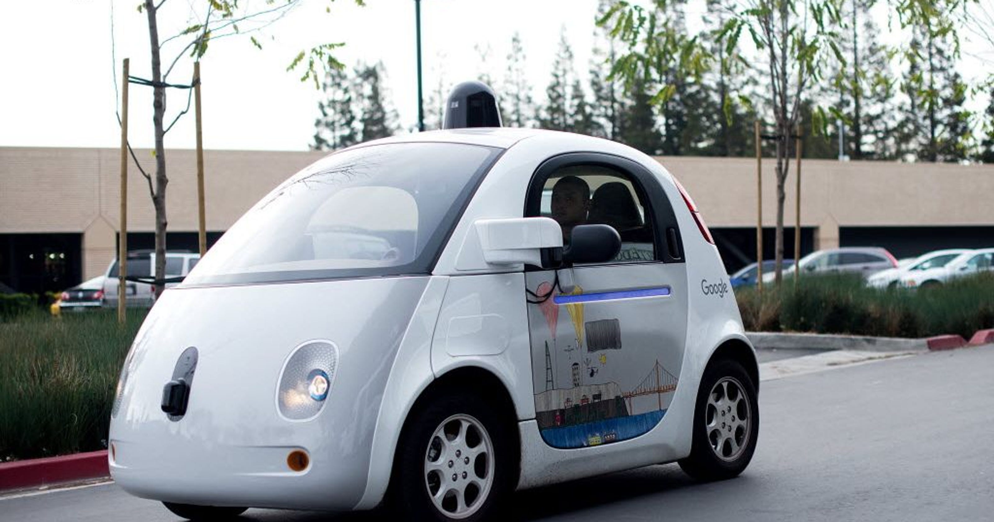 Google car hits bus, first time at fault