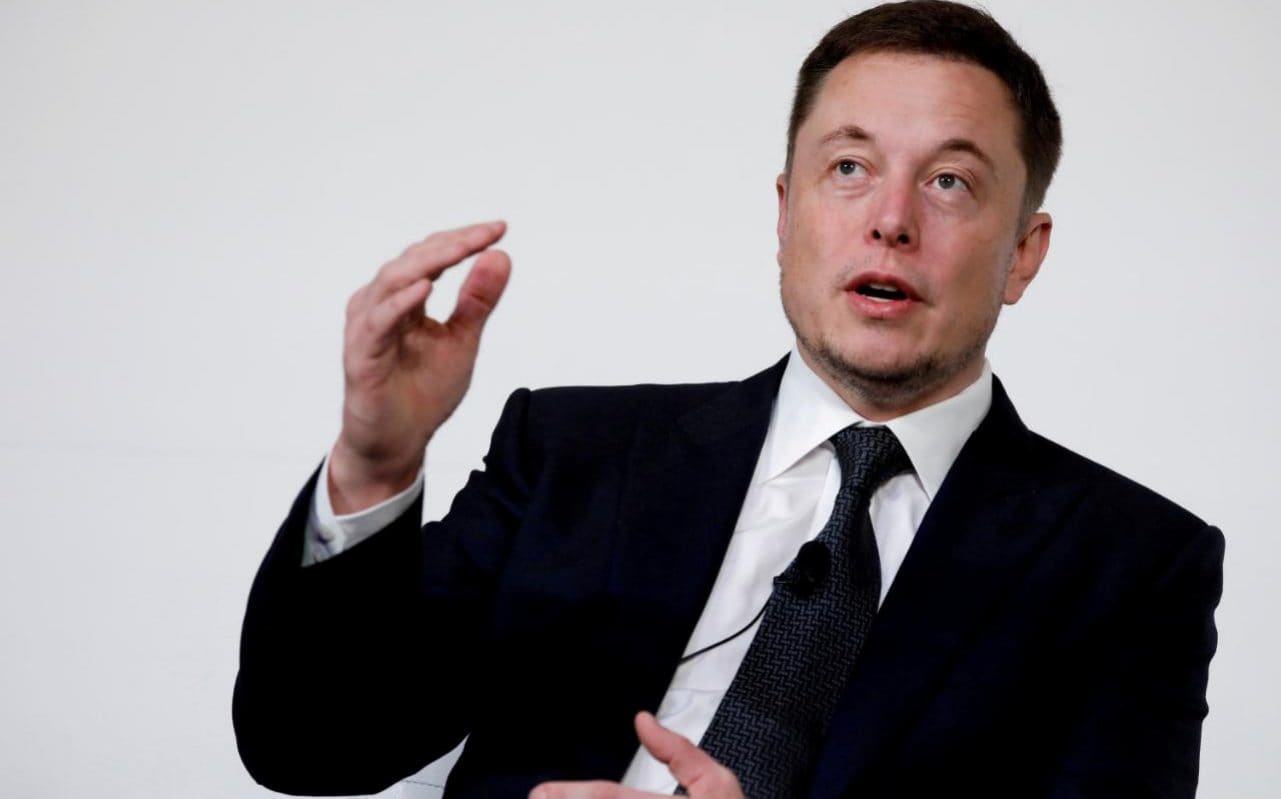 Elon Musk admits robots are slowing down Tesla production - and says humans are the answer