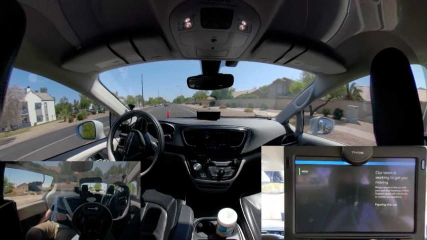 Confused self-driving taxi drives away from its support crew