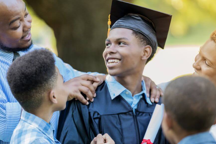 family-congratulating-recent-graduate.jpg