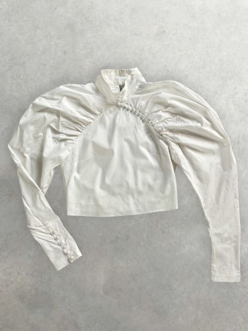 Photo de la pièce Blouse Blanche Rotate à Manches Gigot et Boutons  disponible à la location en ligne ou dans notre showroom à Paris