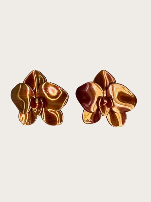 Photo de la pièce Boucles d'oreilles orchidée orange disponible à la location en ligne ou dans notre showroom à Paris