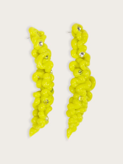 Photo de la pièce Boucles silicone jaunes  disponible à la location en ligne ou dans notre showroom à Paris