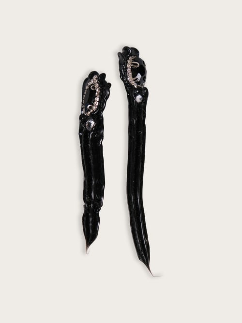Photo de la pièce Boucles silicone noires  disponible à la location en ligne ou dans notre showroom à Paris