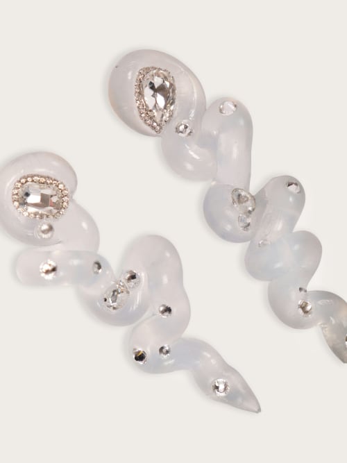 Photo de la pièce Boucles silicone transparentes  disponible à la location en ligne ou dans notre showroom à Paris