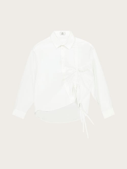 Photo de la pièce Chemise à lacets blanche disponible à la location en ligne ou dans notre showroom à Paris
