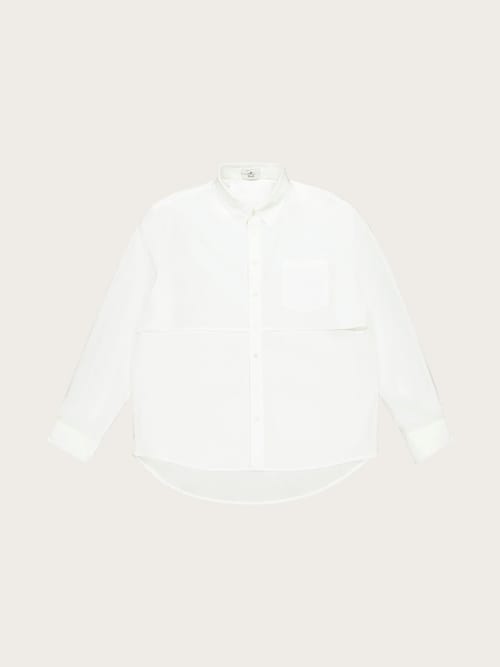Photo de la pièce Chemise fendue blanche disponible à la location en ligne ou dans notre showroom à Paris