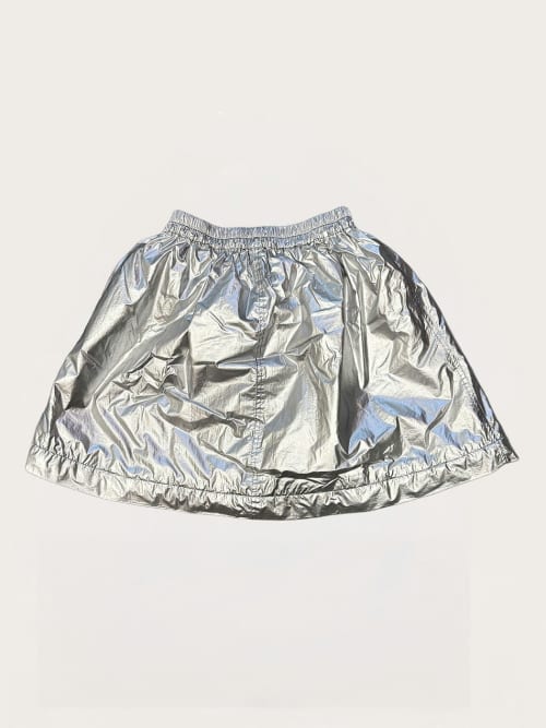 Photo de la pièce Jupe argentée  disponible à la location en ligne ou dans notre showroom à Paris