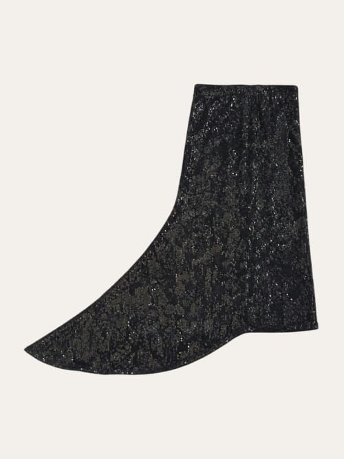 Photo de la pièce Jupe asymétrique à paillettes disponible à la location en ligne ou dans notre showroom à Paris