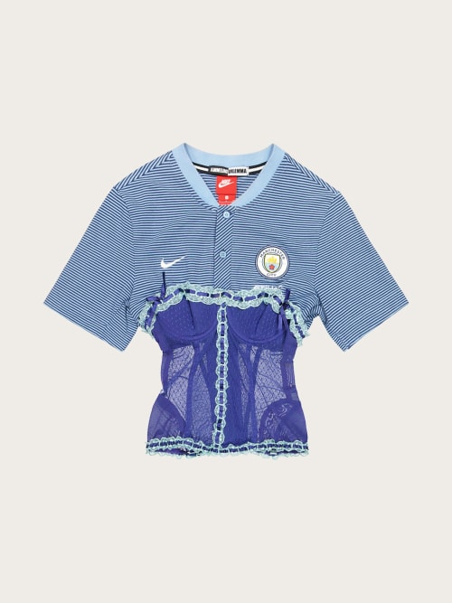 Photo de la pièce Maillot corset Manchester City disponible à la location en ligne ou dans notre showroom à Paris