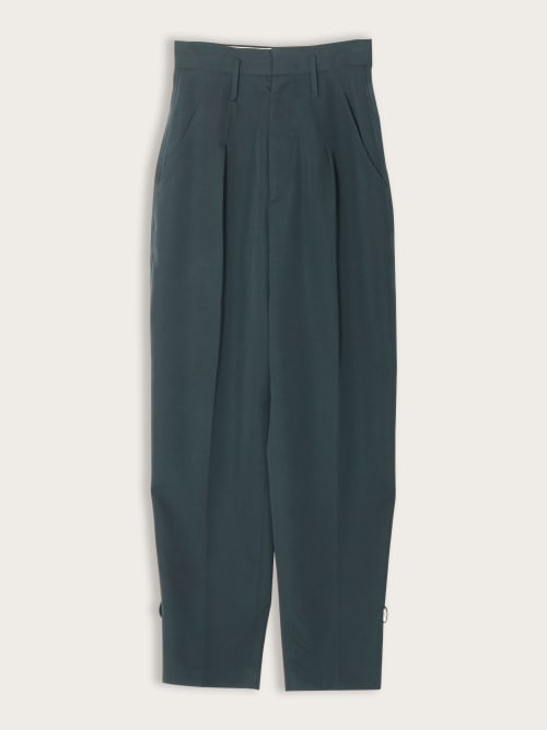 Photo de la pièce Pantalon carotte vert sapin disponible à la location en ligne ou dans notre showroom à Paris