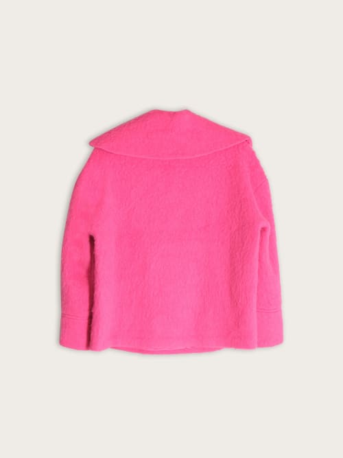 Photo de la pièce Pull Col V Rose disponible à la location en ligne ou dans notre showroom à Paris