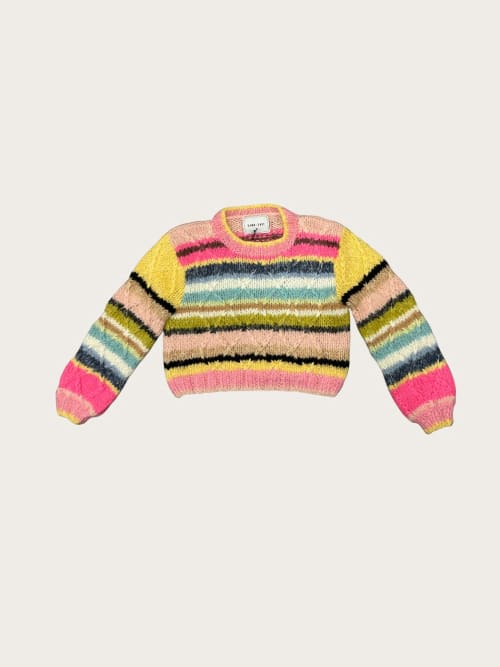 Photo de la pièce Pull multicolore à torsades disponible à la location en ligne ou dans notre showroom à Paris