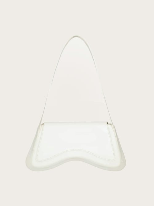 Photo de la pièce Sac blanc arrondi disponible à la location en ligne ou dans notre showroom à Paris