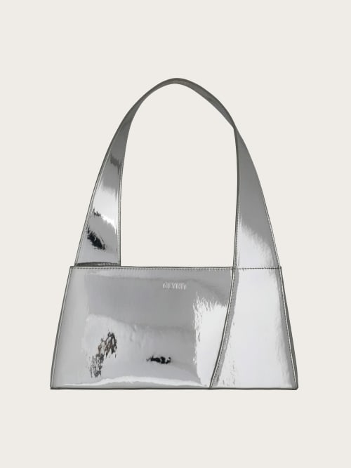 Photo de la pièce Sac déstructuré argenté  disponible à la location en ligne ou dans notre showroom à Paris