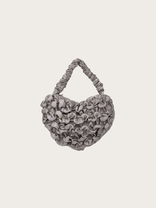 Photo de la pièce Sac texturé gris disponible à la location en ligne ou dans notre showroom à Paris