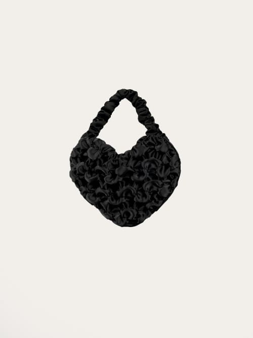Photo de la pièce Sac texturé noir disponible à la location en ligne ou dans notre showroom à Paris