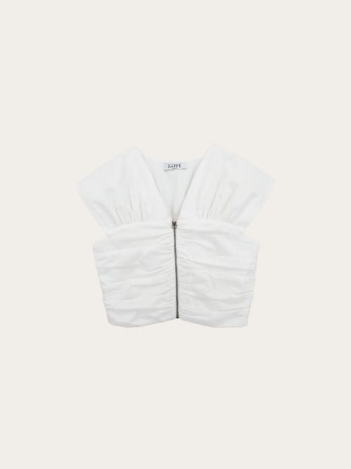 Photo de la pièce Top blanc drapé à zip  disponible à la location en ligne ou dans notre showroom à Paris