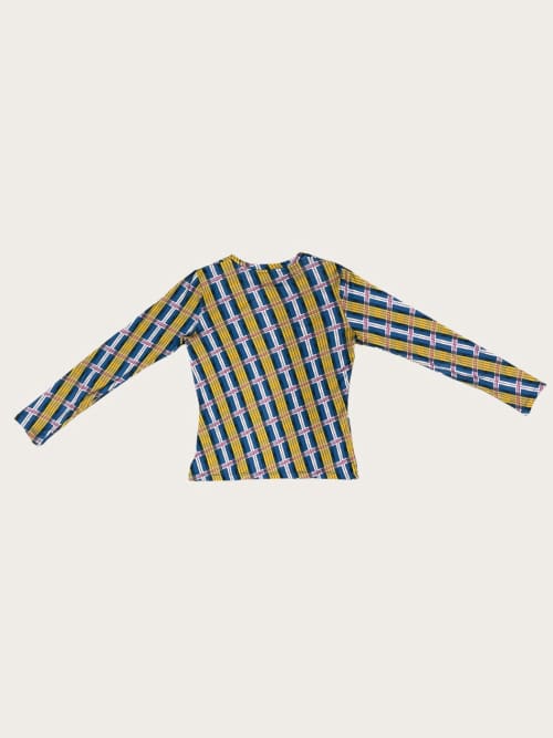 Photo de la pièce Top bleu à motifs à manches longues disponible à la location en ligne ou dans notre showroom à Paris