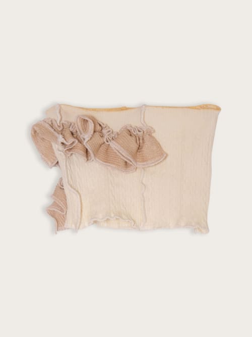 Photo de la pièce Top bustier beige disponible à la location en ligne ou dans notre showroom à Paris