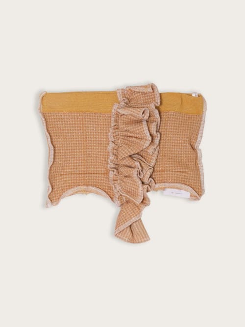 Photo de la pièce Top bustier beige disponible à la location en ligne ou dans notre showroom à Paris