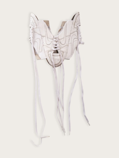 Photo de la pièce TOP CORSET NIKE  disponible à la location en ligne ou dans notre showroom à Paris