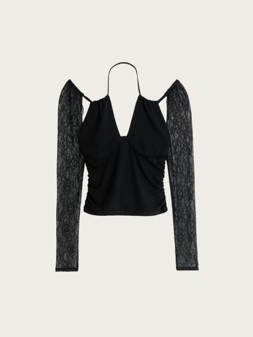 Photo de la pièce Top noir manches longues en dentelle disponible à la location en ligne ou dans notre showroom à Paris
