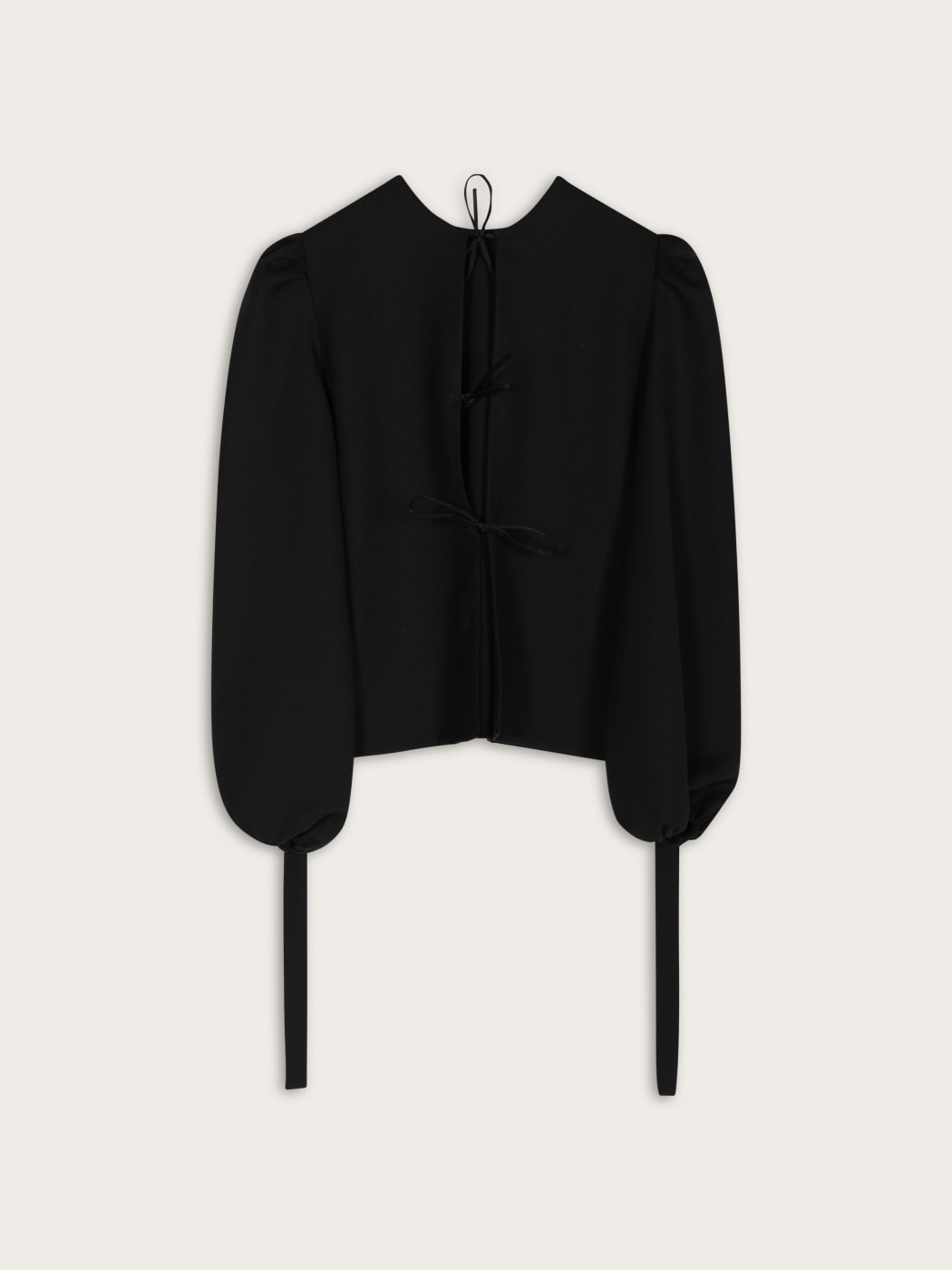 Photo principale du produit Blouse à noeuds noire de la marque Suzel
