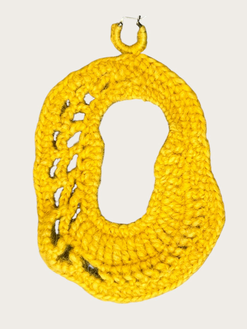 Photo principale du produit Boucles en crochet jaunes de la marque Sake