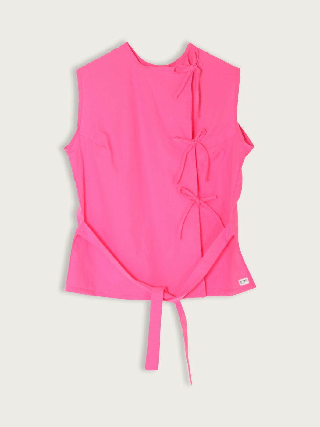 Photo principale du produit Blouse rose à noeuds  de la marque Suzel