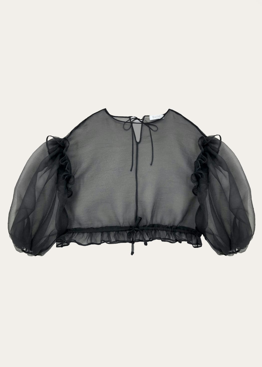 Photo principale du produit Top noir transparent manches longues bouffantes de la marque Esthé