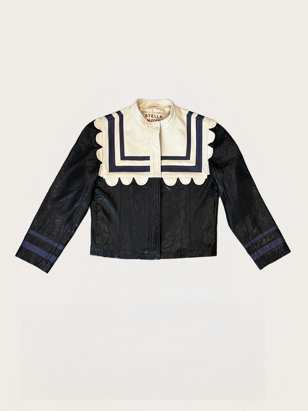 Photo principale du produit Veste en cuir bleu marine beige claire de la marque Stella Nova