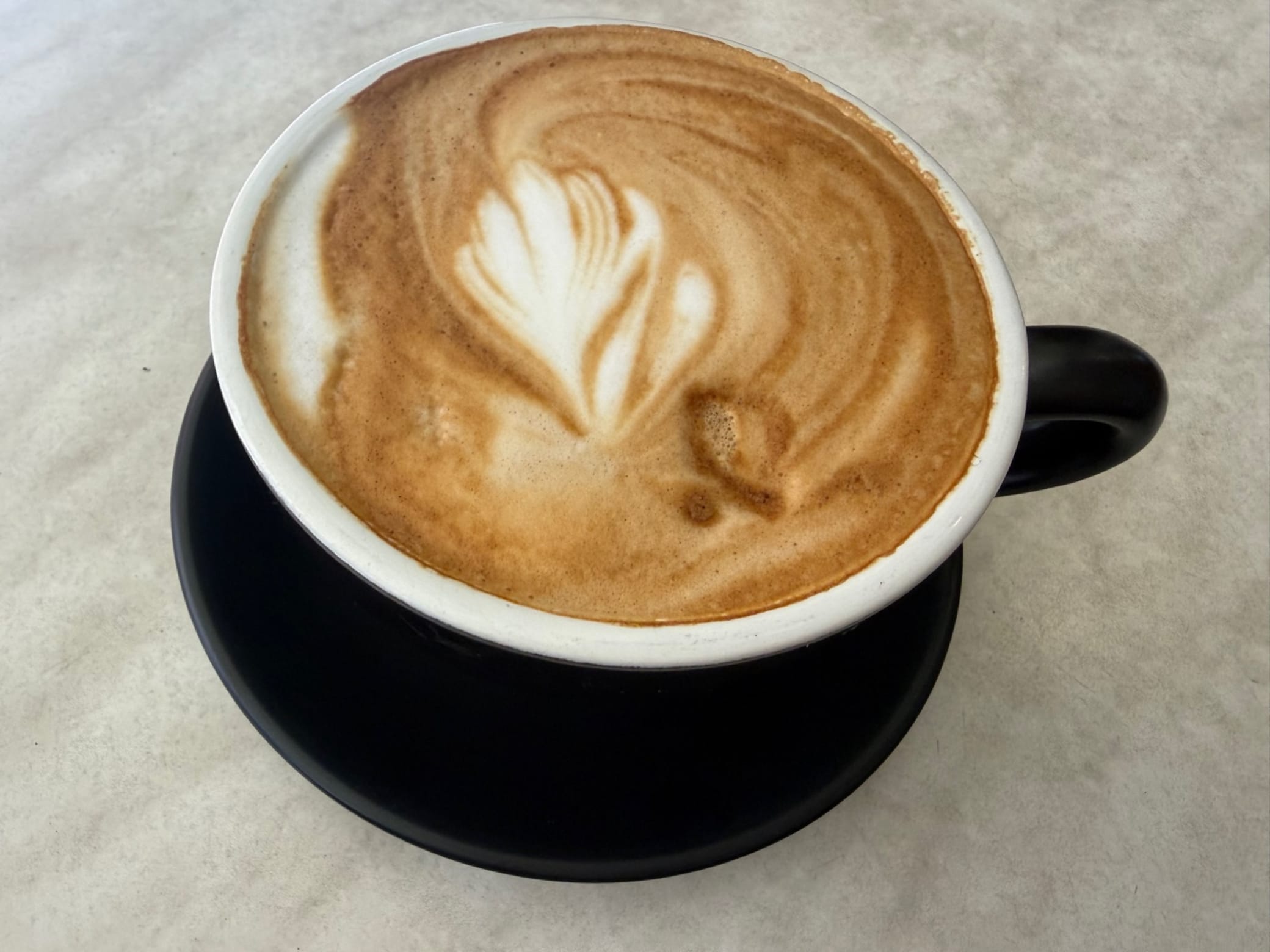 Flat White at La Famiglia Cafe