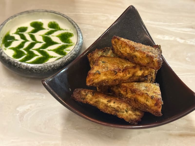 Crispy Shredded Zucchini with an Herb. Feta, and at Senia