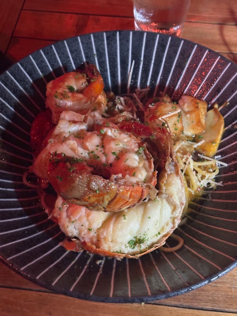 Signature Seafood Pasta with Scallops, Shrimp, Lobster, Sun-dried Tomato Pesto, Sake, Mushroom, Arug at The Crouching Lion
